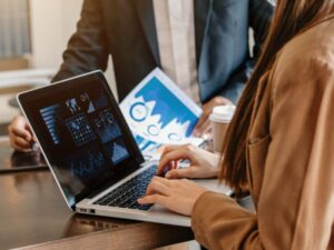 A lady and man accessing their business sytems online